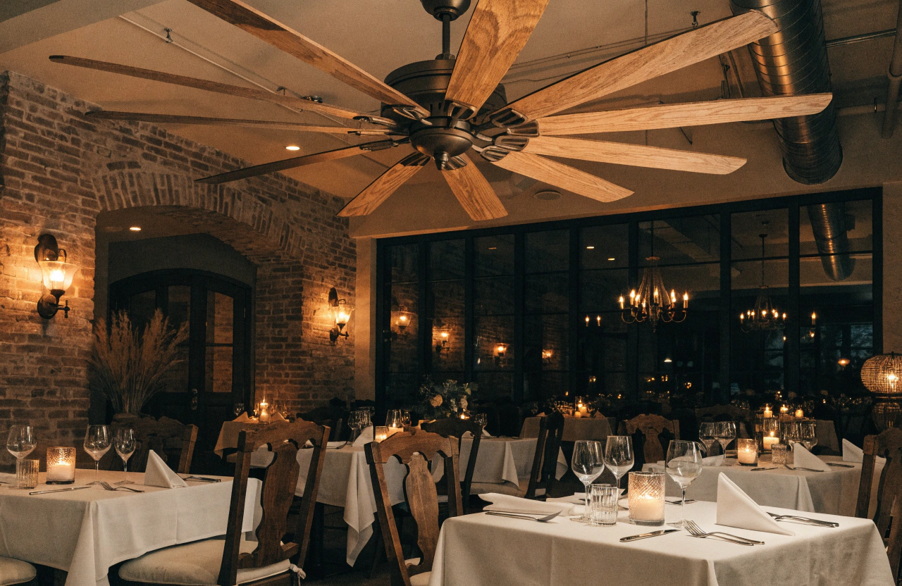 Choosing the Right Ceiling Fan Size A large, stylish ceiling fan in a restaurant dining area